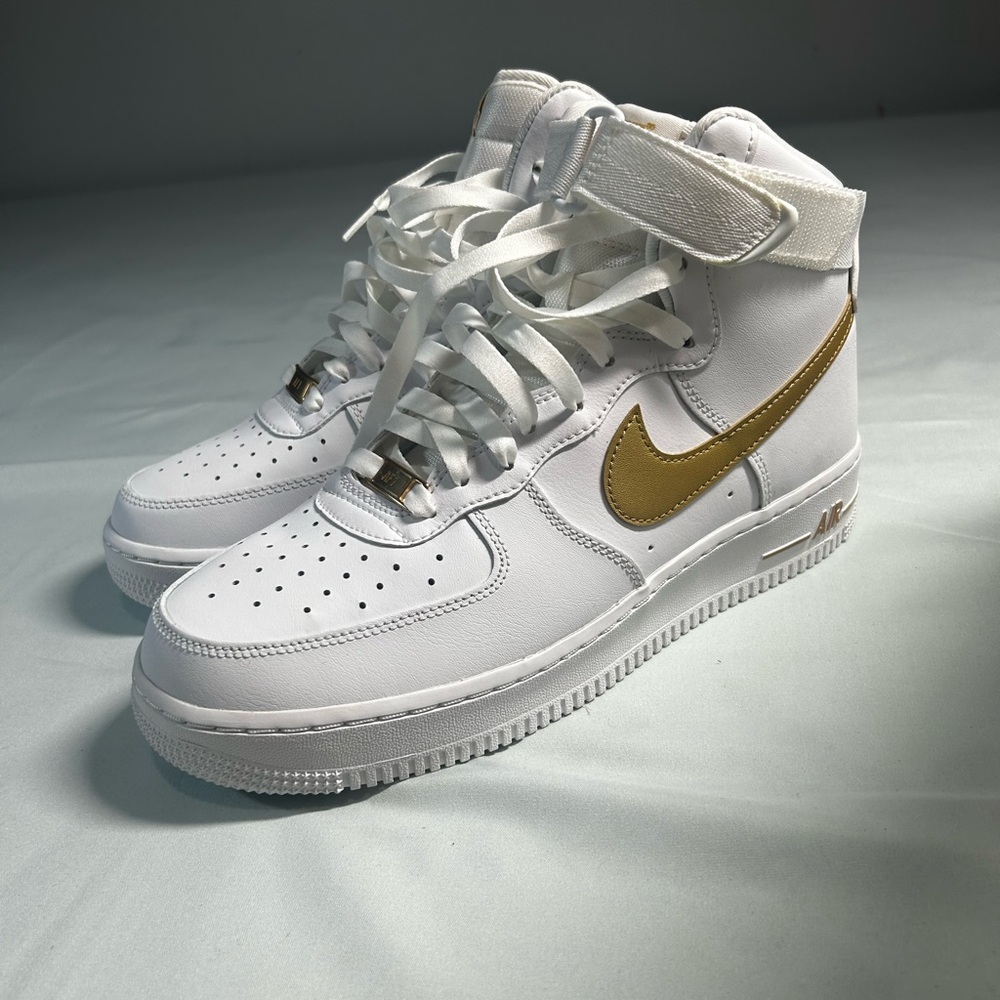 Nike High-Top Sneakers in White and Gold
